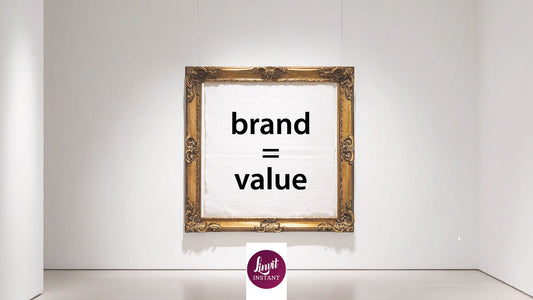 Gold frame in a minimalist art gallery featuring black and white text 'Brand Equals Value,' symbolizing luxury, simplicity, and modern brand identity.