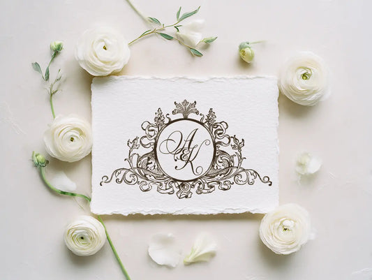 Custom vintage wedding monogram featuring classic intertwined initials and decorative scrollwork, timeless black and white crest design for elegant wedding invitations and heirloom stationery.