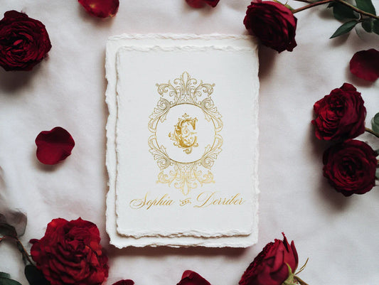 Wedding monogram for wedding invitations featuring a delicate floral wedding logo design