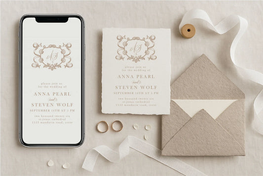 Flatlay showing a fine art wedding invitation printed on handmade deckled-edge paper and its matching digital version displayed on a phone screen. includes a luxury monogram crest -linvitinstant