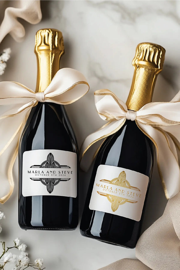 wedding monogram design, mockup with two mini champagne bottles showing how the logo scales on a white background